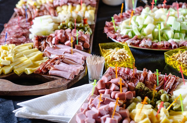 Multiple meat and cheese platters.